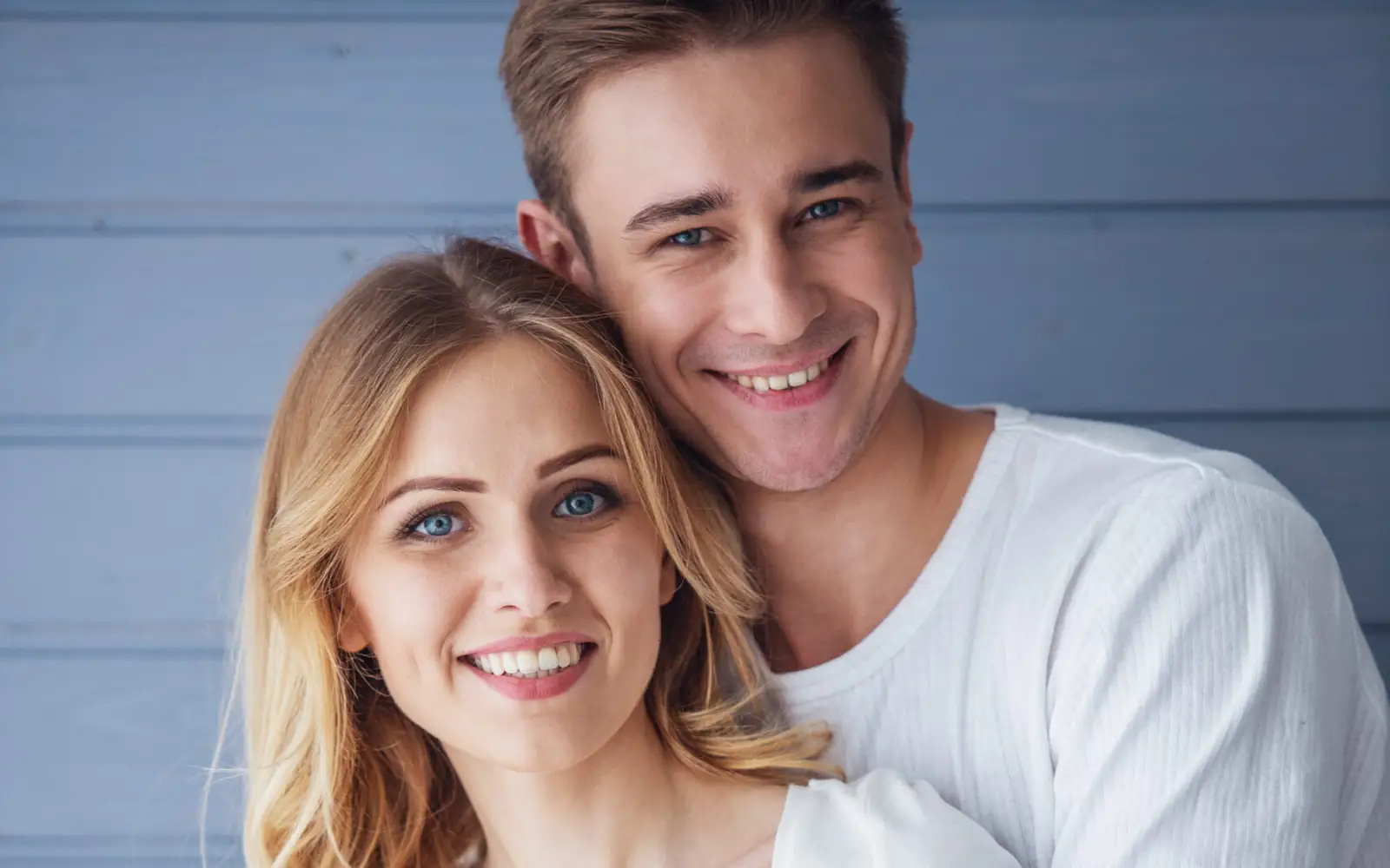 Couple standing together, relaxed and at ease